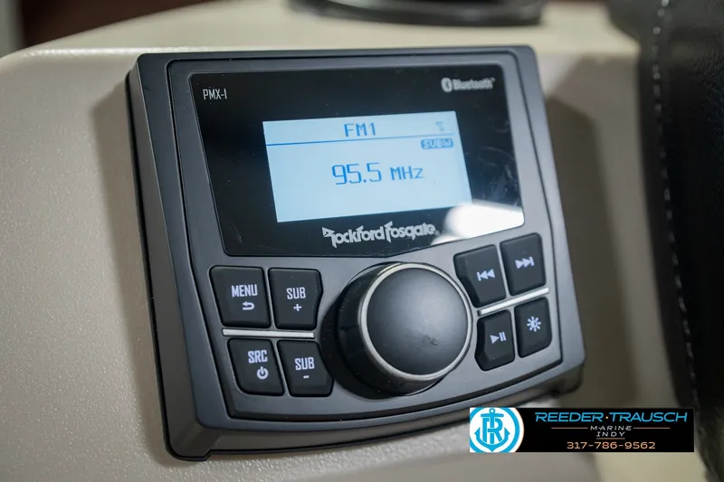 Slide: The Image of 2027 Bennington 22 SLJ boat stereo system displaying FM radio frequency. - 43
