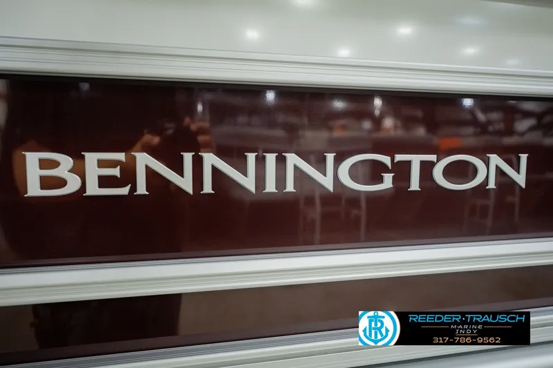 Slide: The Image of 2027 Bennington 22 SLJ boat logo with Reeder-Trausch Marine contact details. - 58