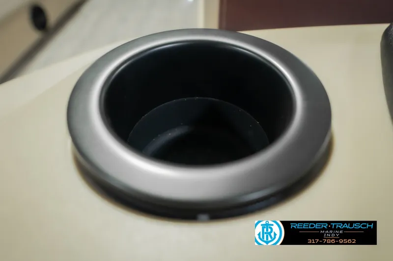 Slide: The Image of Cup holder on 2027 Bennington 22 SLJ boat, featuring Reeder-Trausch Marine branding. - 55