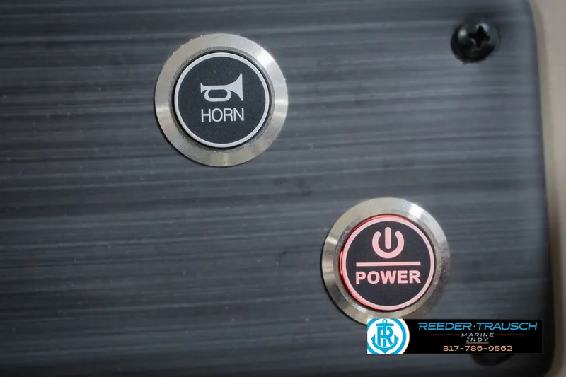 Slide: The Image of Control panel of a 2027 Bennington 22 SLJ with horn and power buttons. - 47