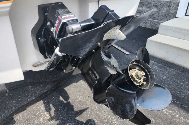 Slide: The Image of 2008 Bayliner 185 boat with MerCruiser outdrive and propeller detail. - 5