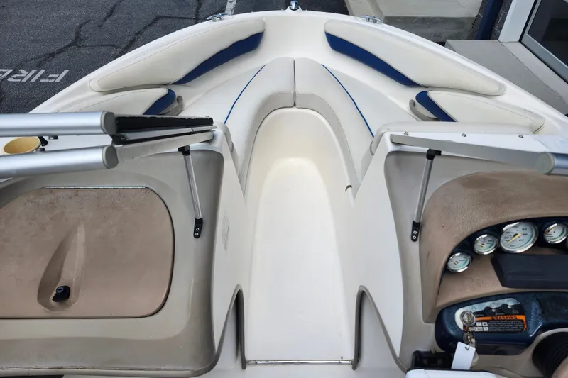 Slide: The Image of 2008 Bayliner 185 boat interior with seating and dashboard gauges. - 30