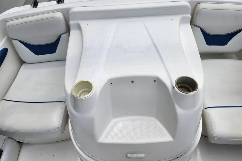 Slide: The Image of Interior seating of a 2008 Bayliner 185 boat with cup holders. - 14