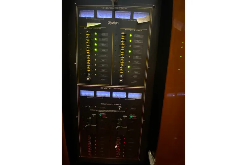 Slide: The Image of Electrical control panel on a 1995 Silverton 41 Convertible boat. - 22