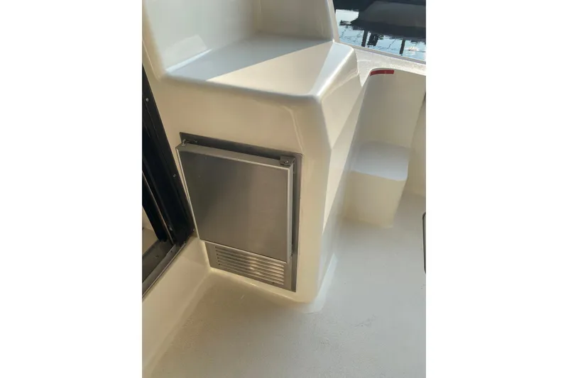 Slide: The Image of 1995 Silverton 41 Convertible boat interior with built-in stainless steel appliance. - 8