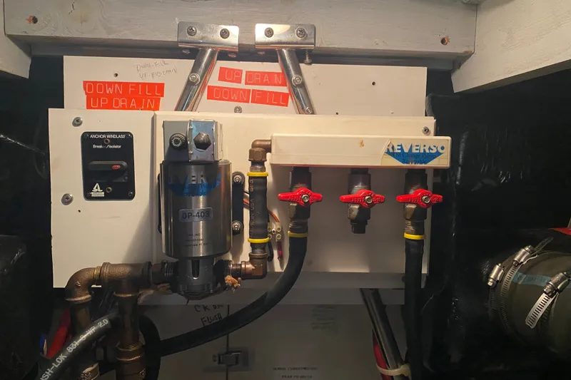 Slide: The Image of Engine room of a 1995 Silverton 41 Convertible with Reverso oil change system. - 26