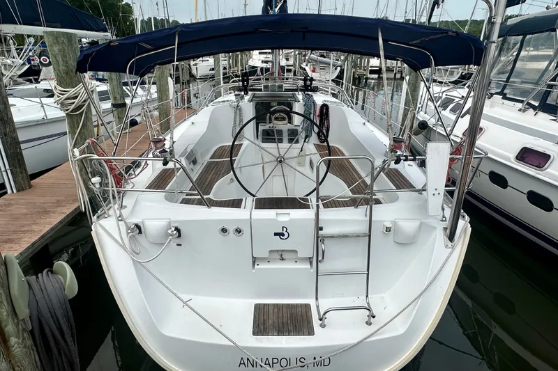 Slide: The Image of 2004 Beneteau Oceanis Clipper 393 sailboat docked in Annapolis marina. - 2