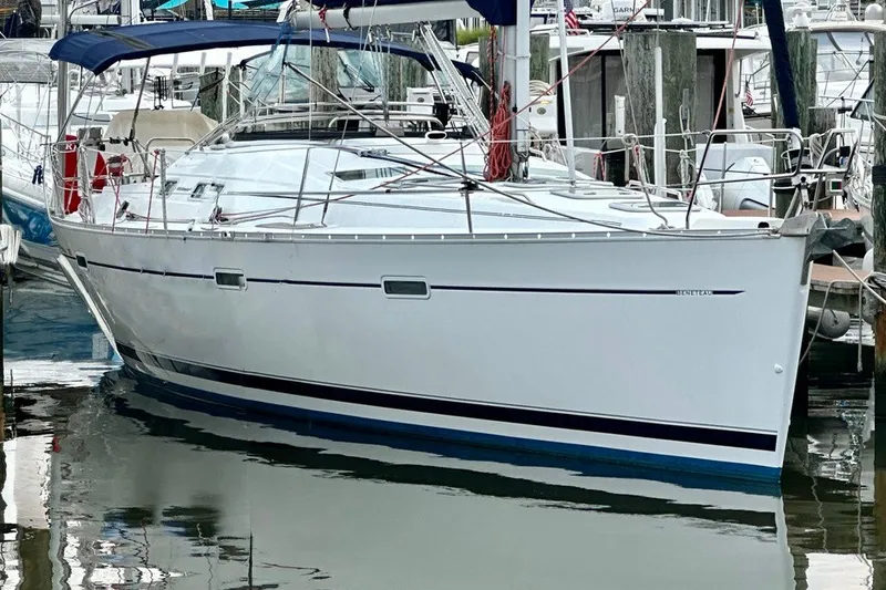 The Image of 2004 Beneteau Oceanis Clipper 393 sailboat docked in a marina. - 0