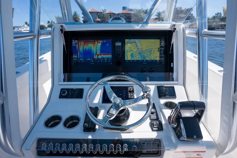Slide: The Image of 2025 SeaVee 322Z boat dashboard with advanced navigation and control systems. - 6