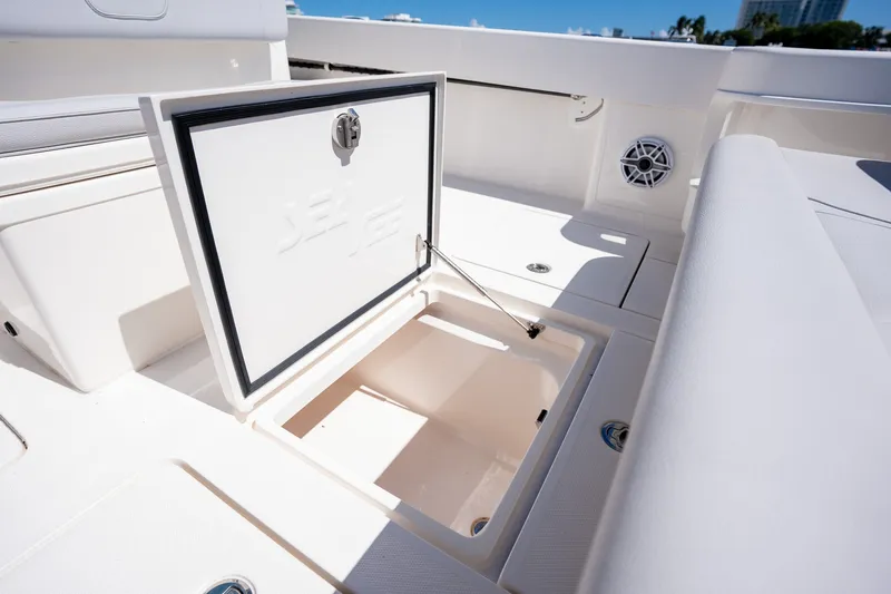 Slide: The Image of Open storage compartment on 2025 SeaVee 322Z boat deck, showcasing sleek design and functionality. - 15