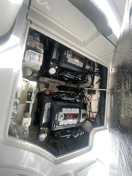 Slide: The Image of Engine compartment of a 2018 Four Winns 355 Vista with two engines. - 11