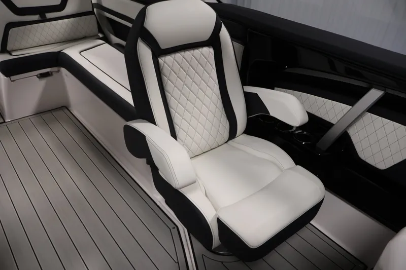 Slide: The Image of Luxurious interior seating of 2026 Yamaha Boats 275SE with quilted upholstery and sleek design. - 26