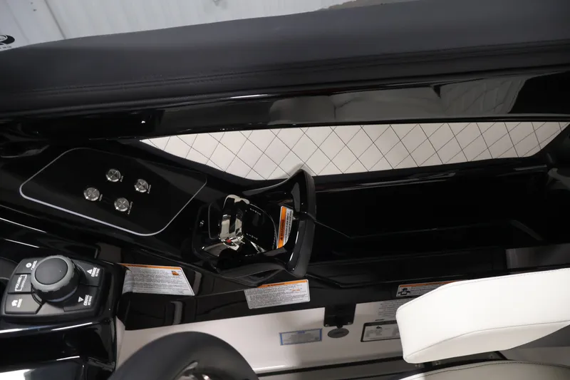 Slide: The Image of 2026 Yamaha Boats 275SE cockpit with sleek controls and modern design. - 23
