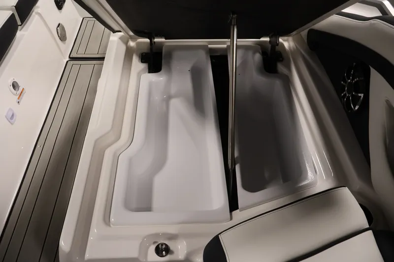 Slide: The Image of 2026 Yamaha Boats 275SE storage compartments with sleek design and modern features. - 35