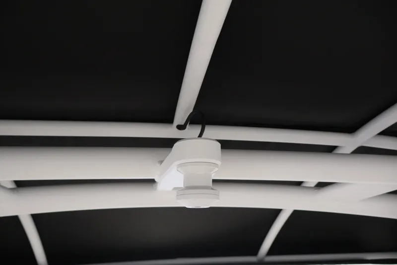Slide: The Image of Ceiling detail of 2026 Yamaha Boats 275SE, featuring sleek white framework. - 39