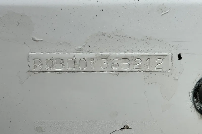 Slide: The Image of Hull identification number on 2012 Robalo R247 Dual Console boat. - 41