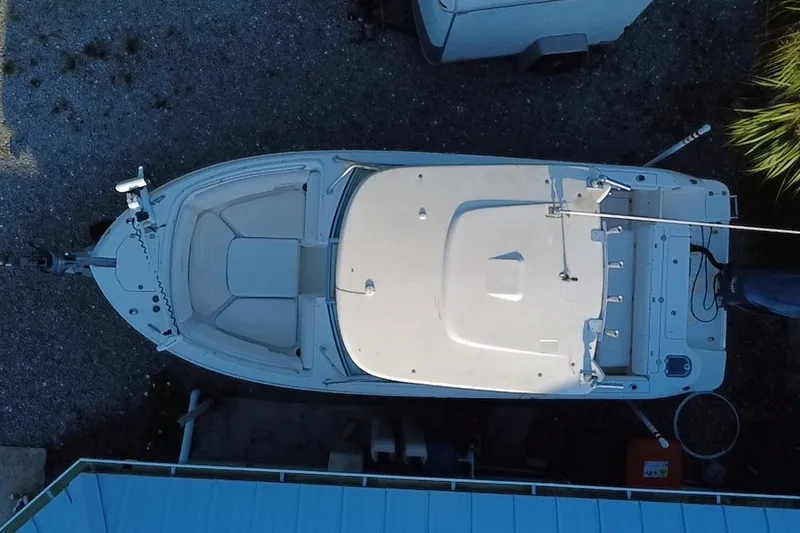 Slide: The Image of Overhead view of a 2012 Robalo R247 Dual Console boat on a trailer. - 7