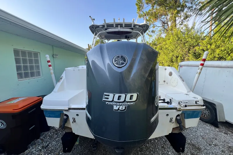 Slide: The Image of 2012 Robalo R247 Dual Console boat with Yamaha 300 V6 outboard engine. - 12