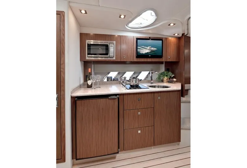 Slide: The Image of galley with fridge and sink and cook top - 36