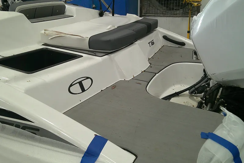 Slide: The Image of 2026 Tahoe T16 boat interior with seating and storage compartments. - 1