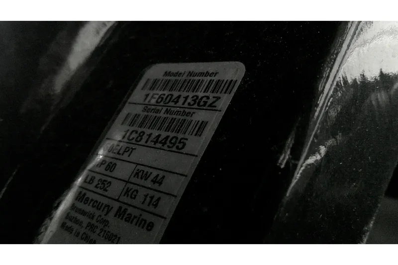 Slide: The Image of Label on a 2026 Tahoe T16, displaying model and serial numbers. - 9