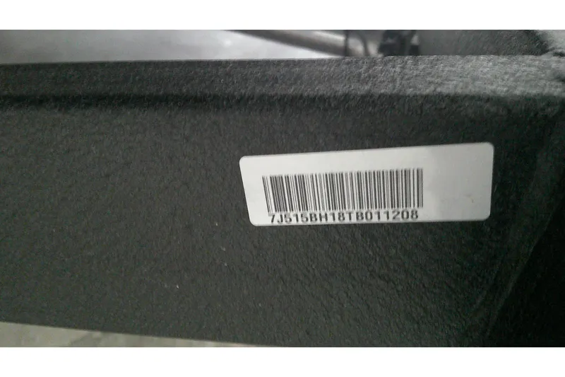Slide: The Image of Barcode label on 2026 Tahoe T16 vehicle component. - 11