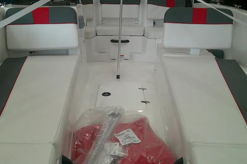 Slide: The Image of 2026 Tahoe T18 boat interior with white and red seating, showcasing modern design. - 7
