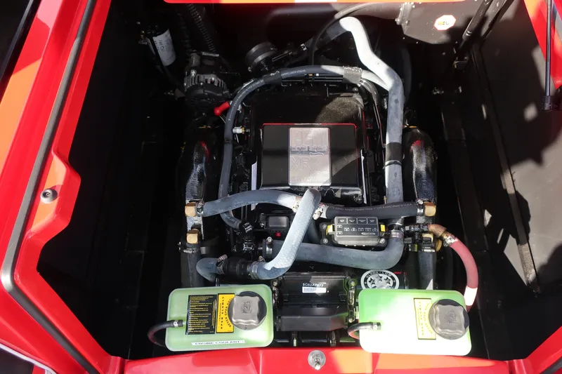 Slide: The Image of Engine compartment of a 2019 Nautique Super Air Nautique G23 boat. - 13