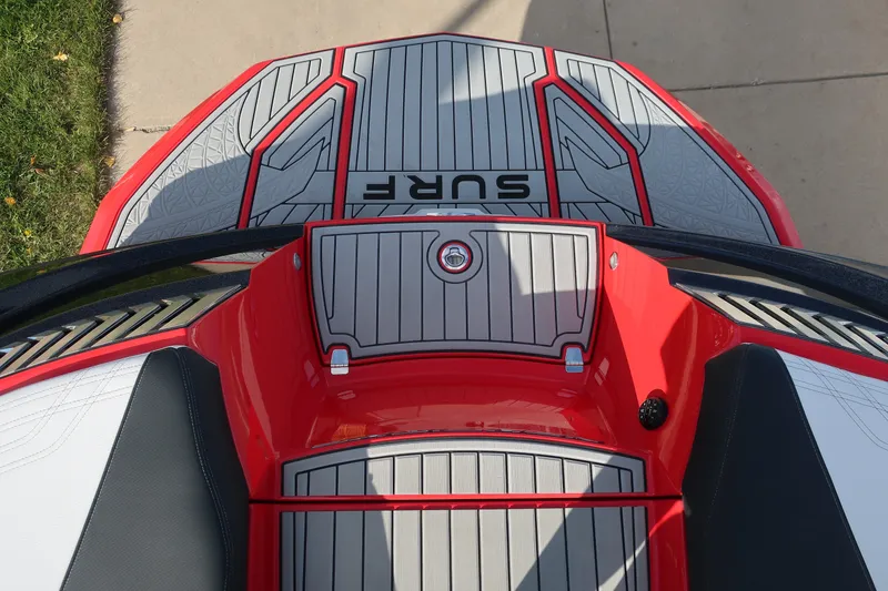 Slide: The Image of 2019 Nautique Super Air Nautique G23 boat deck, featuring red and gray design. - 9