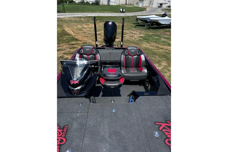 Slide: The Image of 2024 Ranger Z520R boat interior with red and black seats, showcasing modern design. - 14