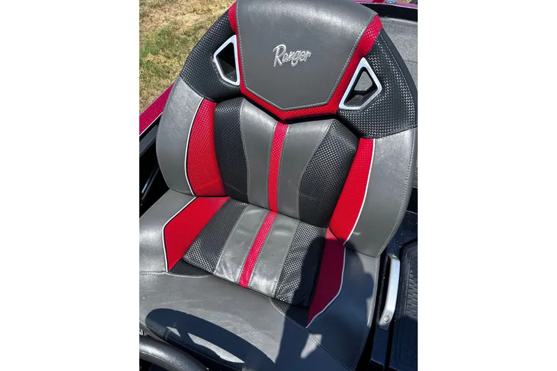 Slide: The Image of 2024 Ranger Z520R seat with red and gray design, showcasing premium materials and comfort. - 27