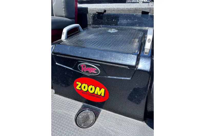 Slide: The Image of 2024 Ranger Z520R boat storage compartment with Zoom Bait Company sticker. - 39