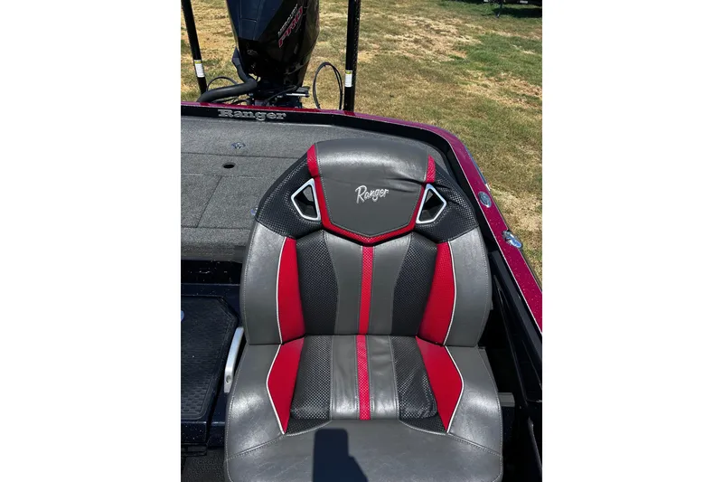 Slide: The Image of 2024 Ranger Z520R boat seat with red and gray design, showcasing brand logo. - 28