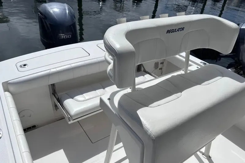 Slide: The Image of 2014 Regulator 23 Forward Seating boat interior with Yamaha 300 engine. - 12