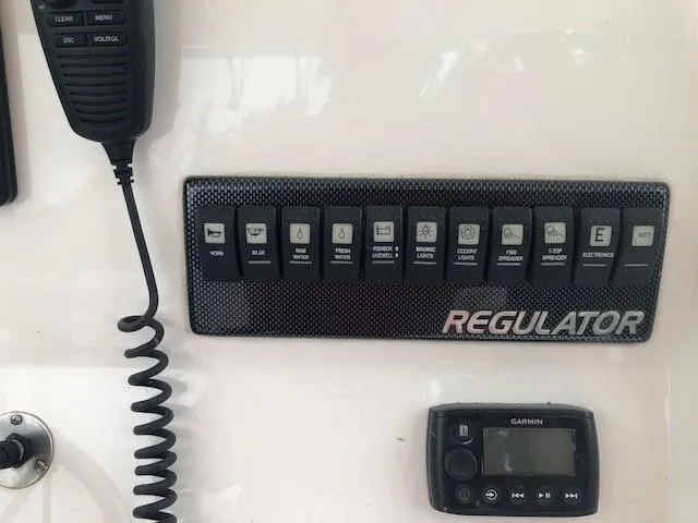 Slide: The Image of Control panel with various switches and a radio microphone. - 7