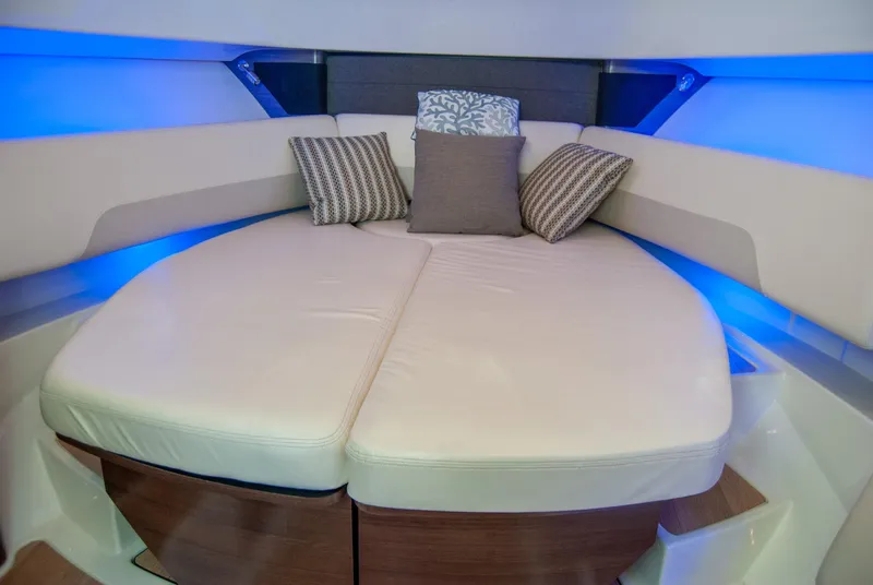Slide: The Image of Luxurious interior cabin of 2021 Boston Whaler 345 Conquest with plush seating and ambient lighting. - 26