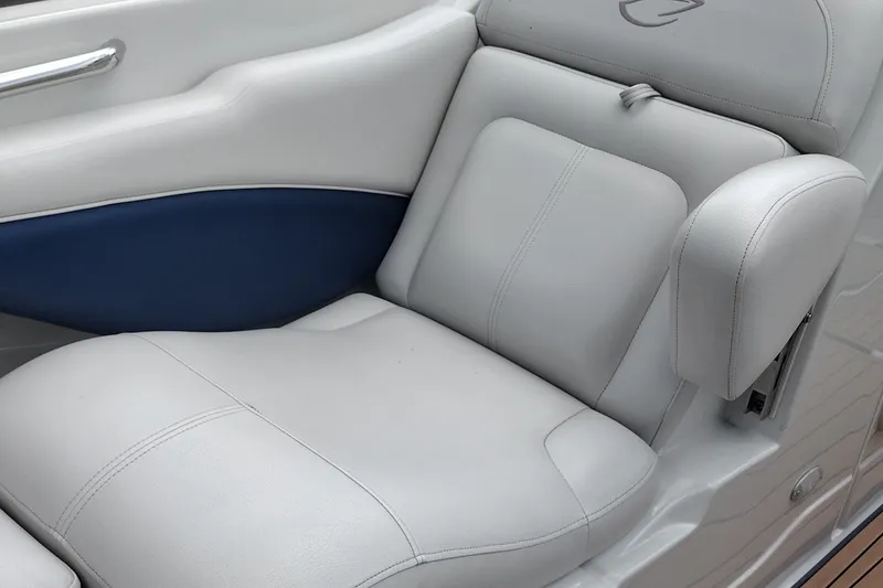 Slide: The Image of 2013 Crownline Eclipse E4 boat seat with white and blue upholstery. - 36