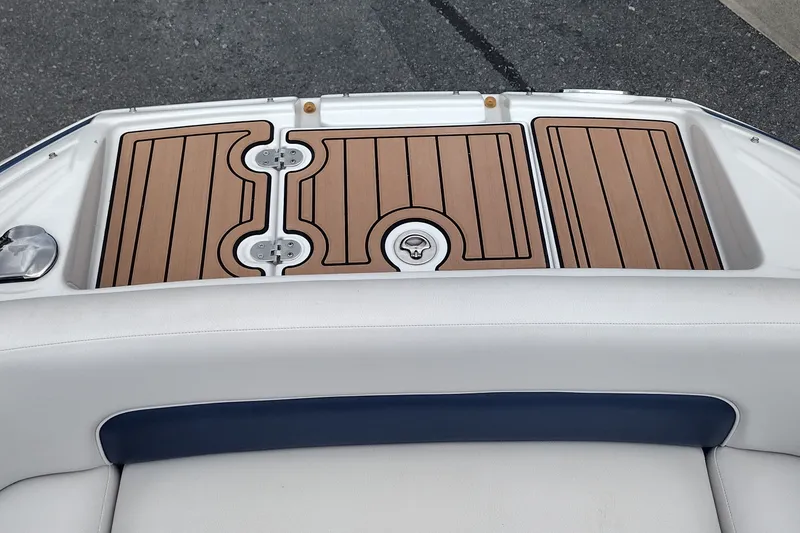 Slide: The Image of 2013 Crownline Eclipse E4 boat swim platform with teak-style decking. - 34