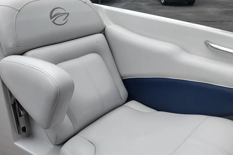 Slide: The Image of 2013 Crownline Eclipse E4 boat interior with white and blue seating. - 35