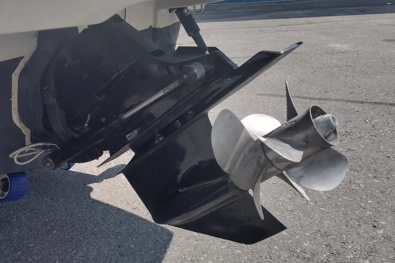 Slide: The Image of Close-up of 2013 Crownline Eclipse E4 boat propeller on pavement. - 8