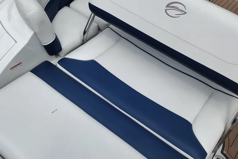 Slide: The Image of 2013 Crownline Eclipse E4 boat interior with white and blue seating. - 40