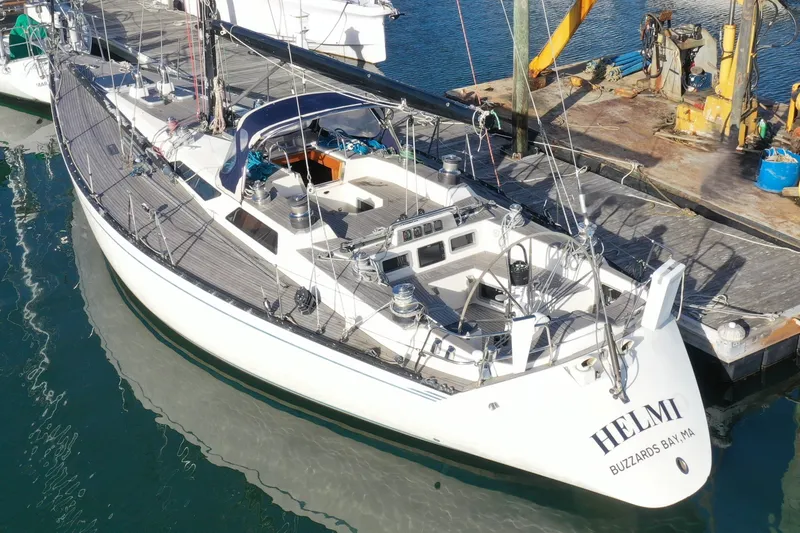 Slide: The Image of Sailboat Baltic 48 DP, 1986 model, docked at marina with wooden deck. - 3