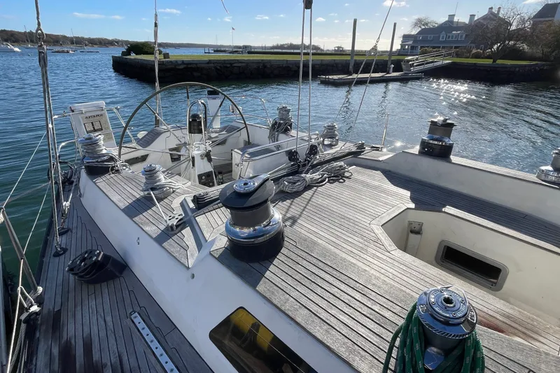 Slide: The Image of Sailing yacht Baltic 48 DP, 1986 model, docked in a serene marina setting. - 12
