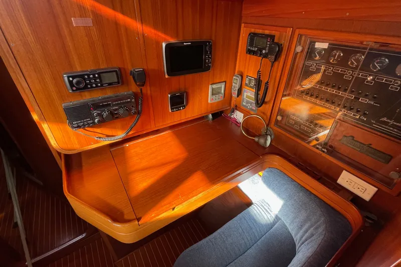 Slide: The Image of Navigation station of a 1986 Baltic 48 DP yacht with communication equipment. - 20