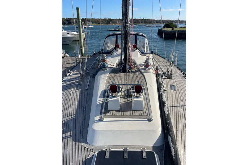 Slide: The Image of 1986 Baltic 48 DP sailboat deck view, docked in a marina. - 14