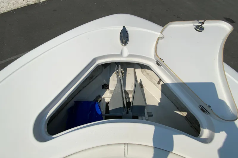 Slide: The Image of Open anchor compartment on 2023 Sportsman Open 232 Center Console boat. - 26