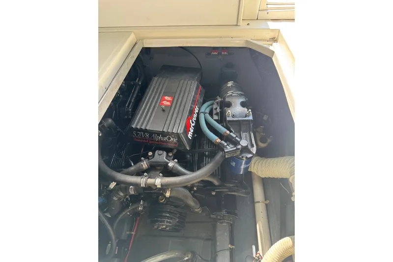 Slide: The Image of Engine compartment of a 1989 Sea Ray 300 Sundancer with 5.7L V8 Alpha One engine. - 9