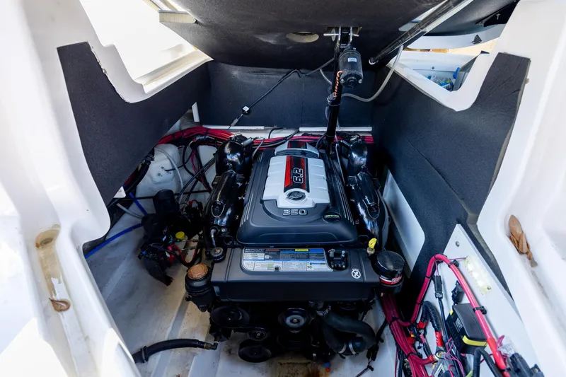 Slide: The Image of Engine compartment of 2022 Sea Ray SLX 280 boat, featuring a 6.2L engine. - 23