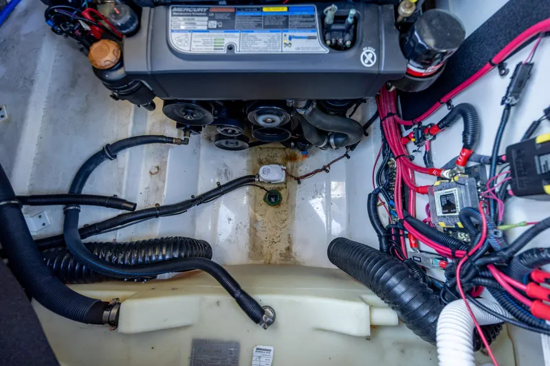 Slide: The Image of Engine compartment of 2022 Sea Ray SLX 280 boat, showcasing wiring and components. - 24