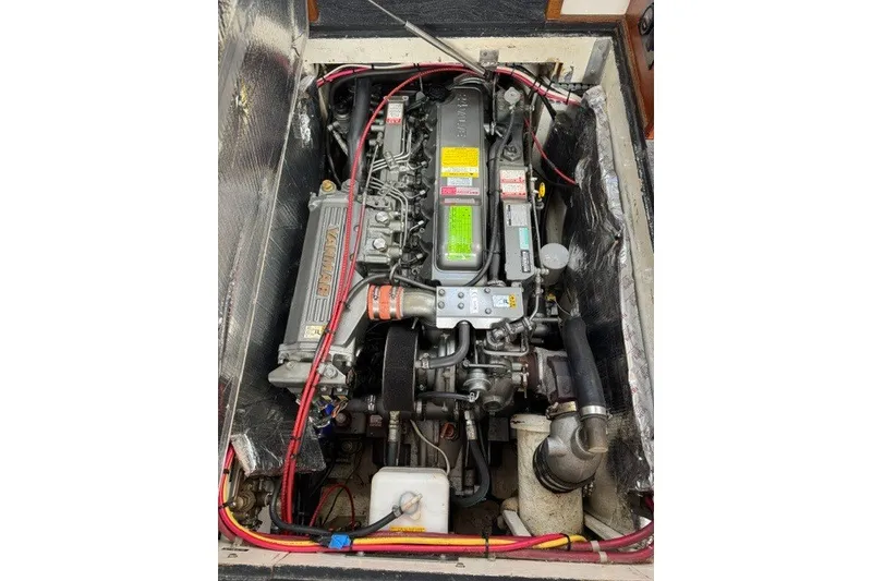 Slide: The Image of Engine compartment of a 2001 Willis Beal 31 boat, featuring a Yanmar engine. - 20